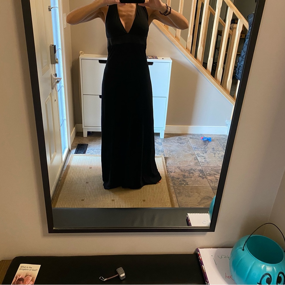 Long black halter dress.